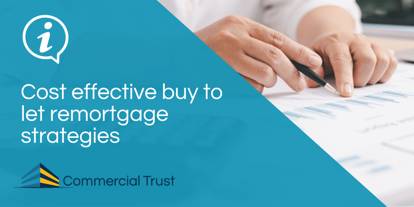 Blue banner with text "Cost effective buy to let remortgage strategies" in front of a photo of a pair of hands pointing to a graph on a piece of paper